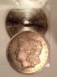An example of a Morgan Dollar cut in half to match a date with a mintmark to have the coin appear something it is not.