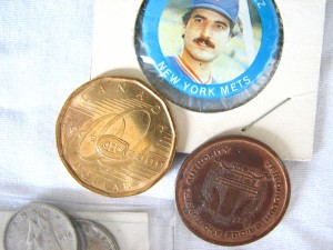 Miscellaneous Items with Canadian dollar, dimes, a TBTA token, and Keith Hernandez souvenir “coin.”