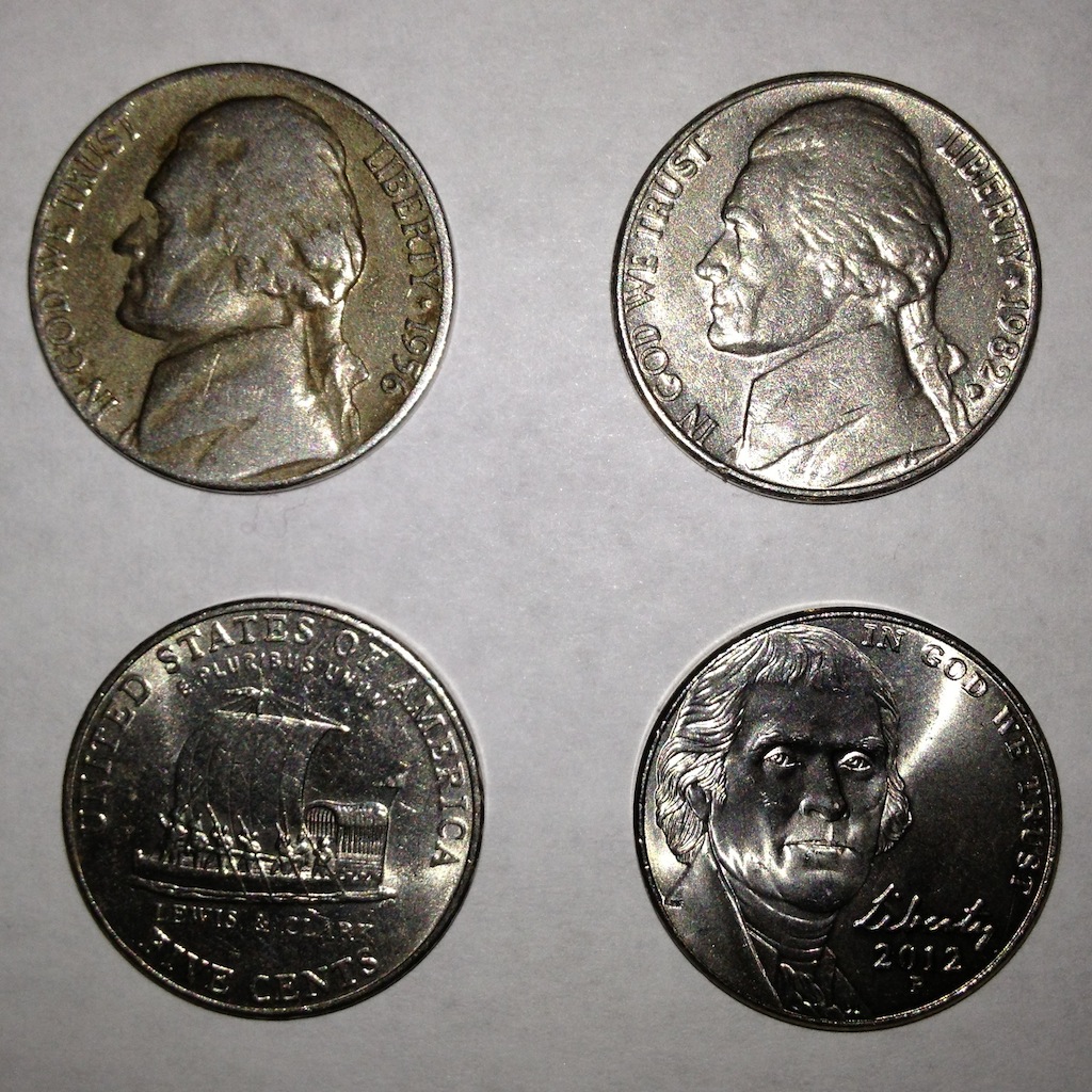 A small type set of Jefferson nickels found in pocket change. Top row: 1956-D and 1982-P. Bottom row: 2004-P Keelboat design and 2012-P.