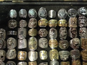 The rings from another artists features designs using coins (see top row)