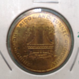 Obverse of the Triborough Bridge and Tunnel Authority Rockaways resident token.