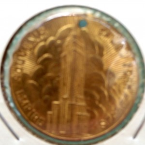 Obverse of the holed Empire State Building medal.