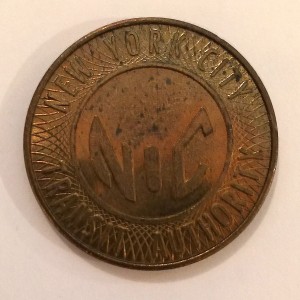 Large Brass "NYC Token" used from 1980-1985 with partial "Y" (obverse)