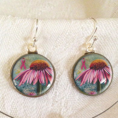 Resin ear rings made by InspiringFlowers using Roosevelt dimes
