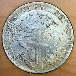 Historic, genuine 1803 Draped Bust design U.S. silver dollars in Very Fine condition are currently valued at about $3,000.  This counterfeit 1803-dated dollar was recently offered in a Hong Kong flea market for less than $3. 