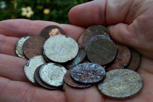 Coins found in the recycling stream.